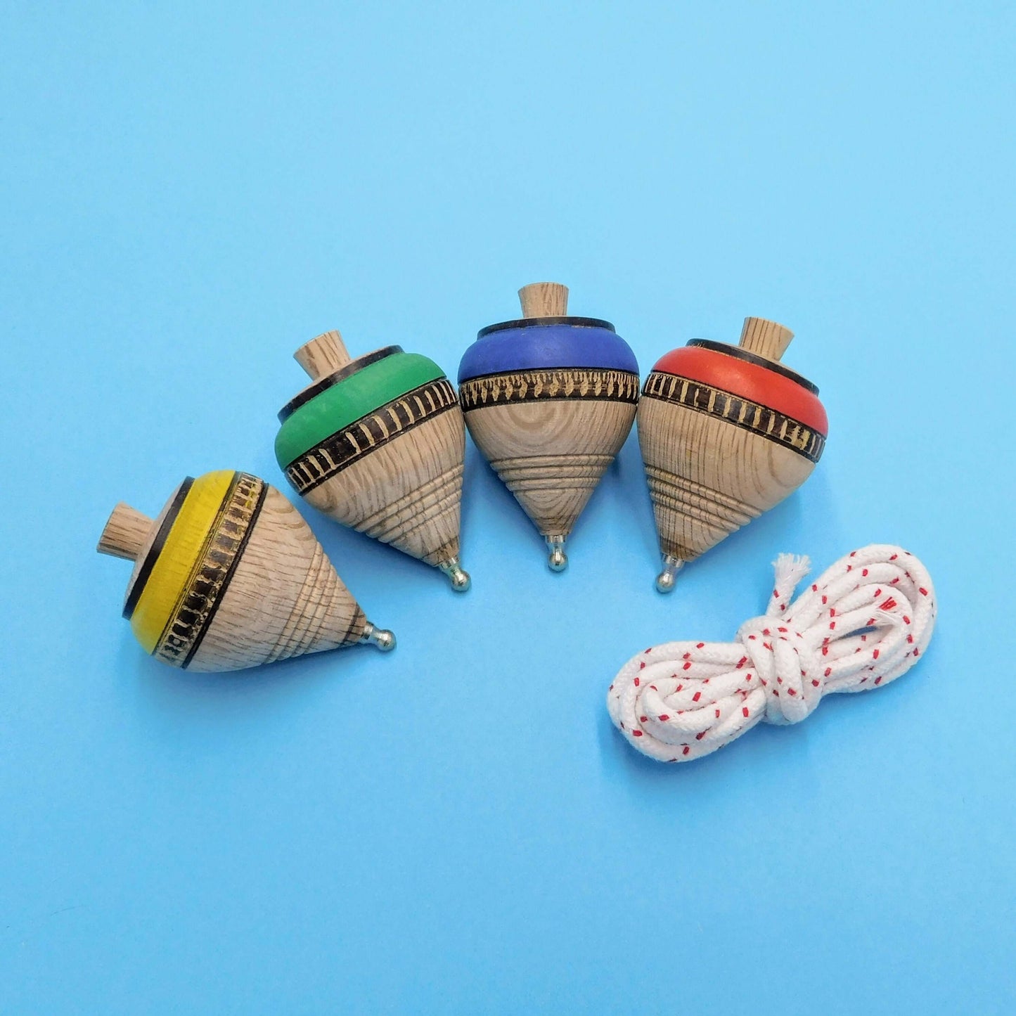 peonza de madera artesanal grupo