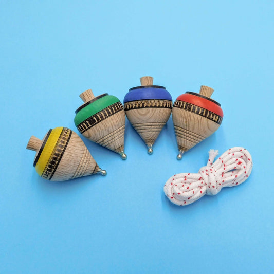 peonza de madera artesanal grupo