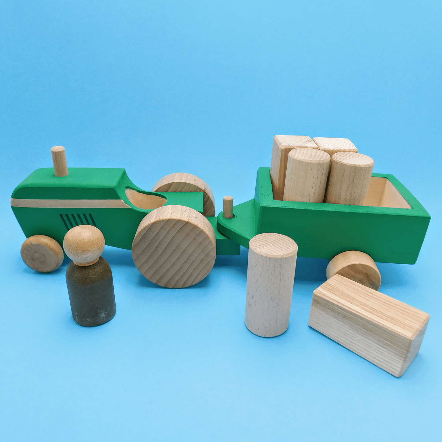 tractor de madera artesanal de juguete con piezas de construcción