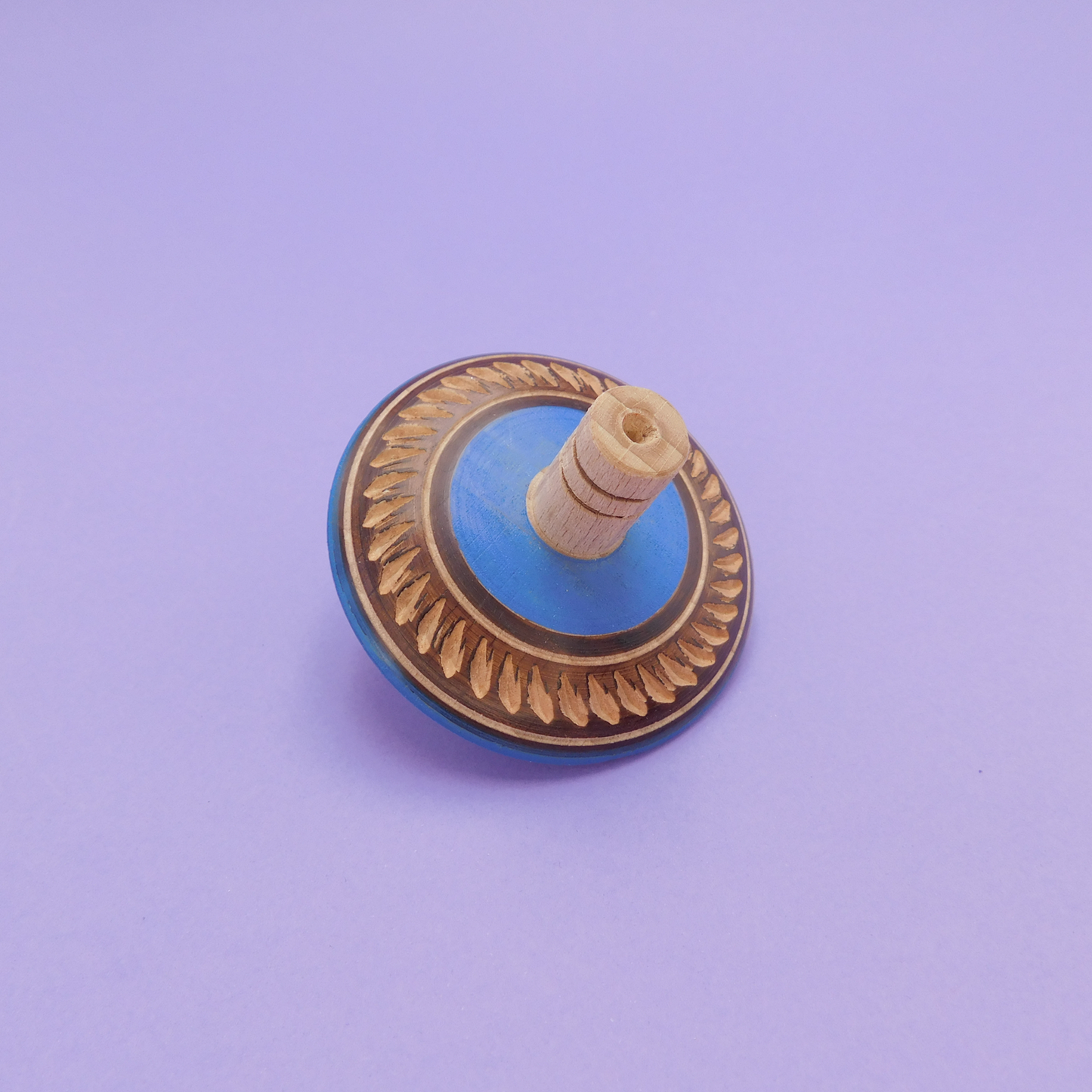 trompo de madera artesanal azul