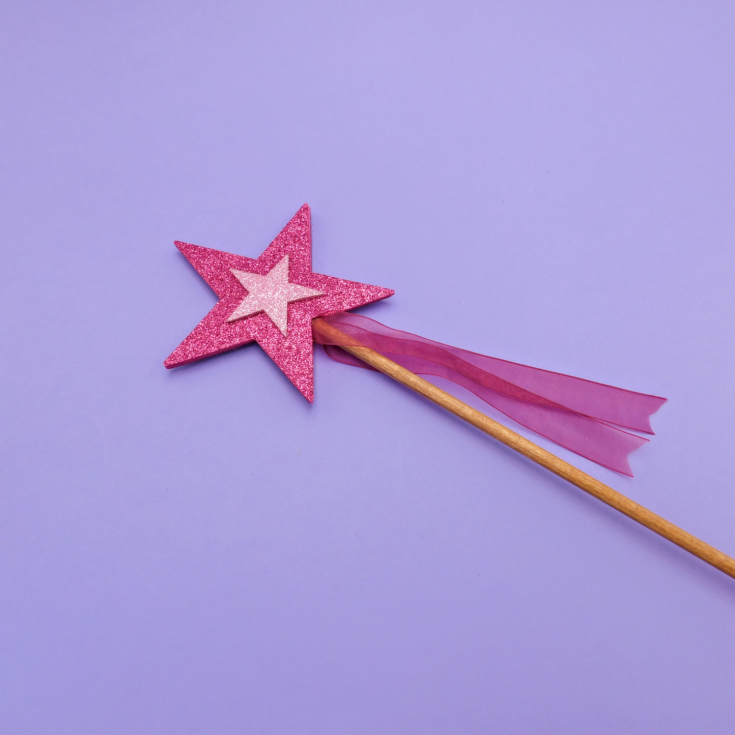varita mágica estrella hecha a mano de juguete rosa fucsia