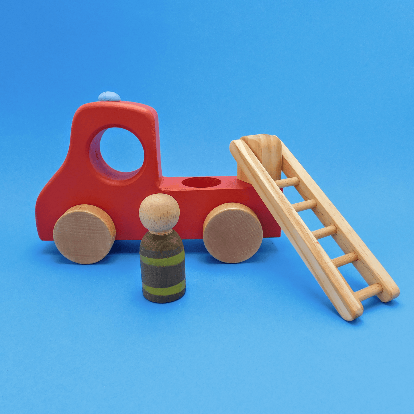 camión de bomberos de juguete montessori
