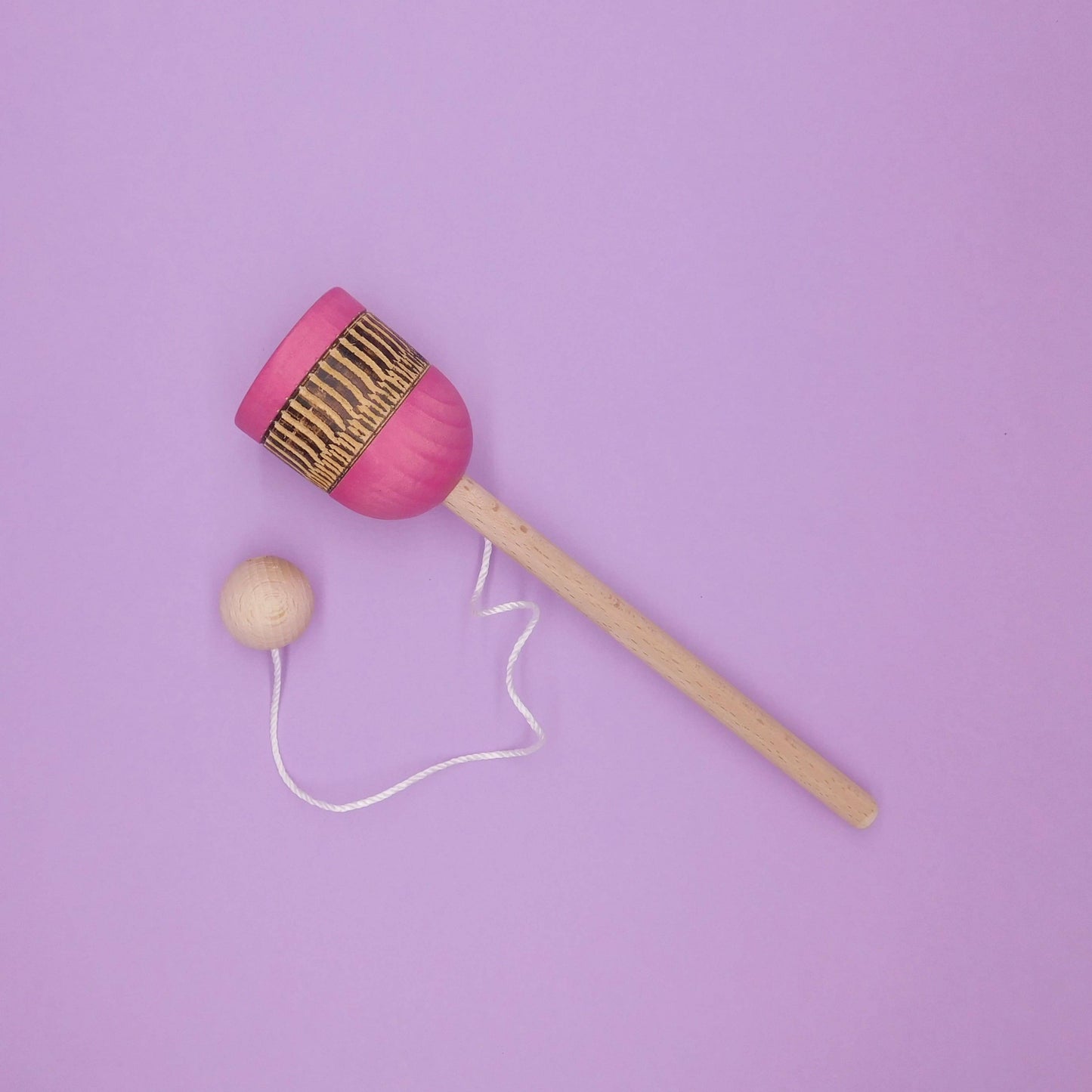 cloc-cloc de madera de juguete rosa