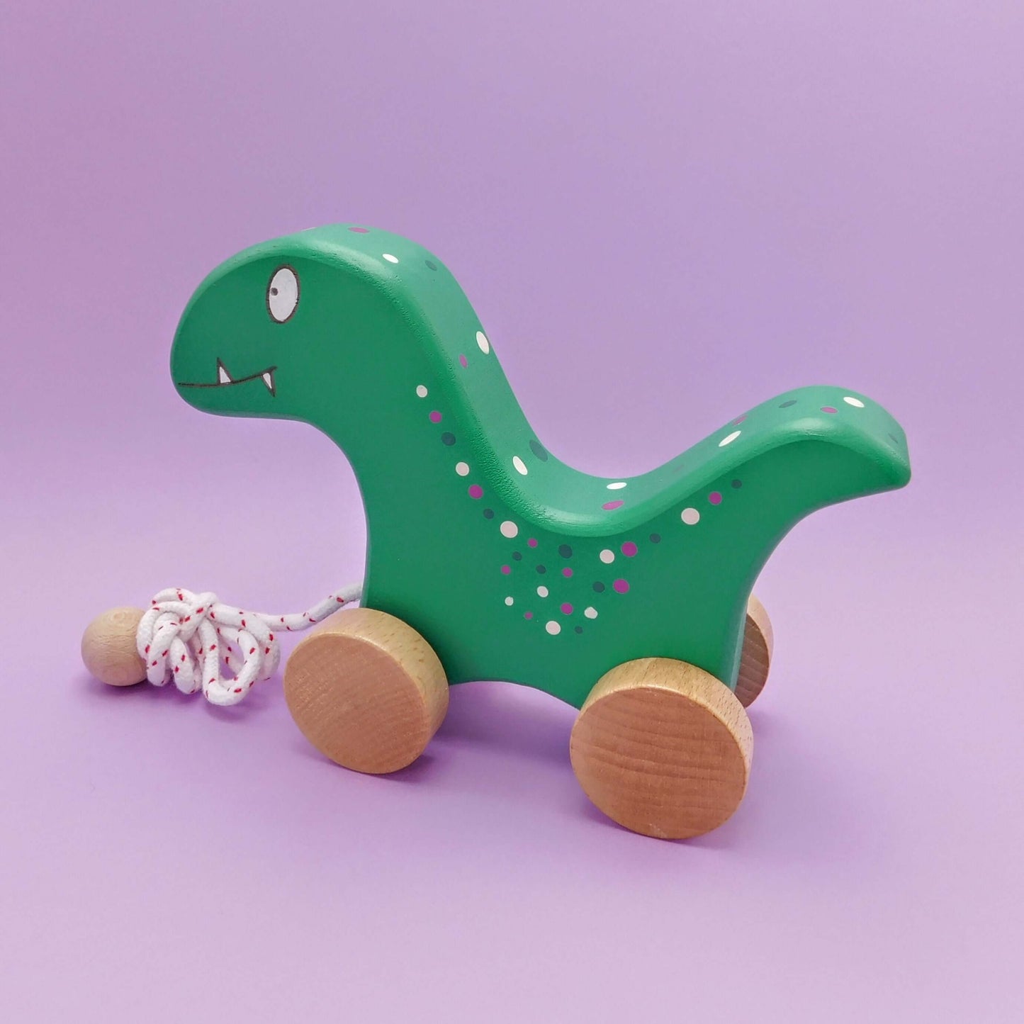 dinosaurio juguete para bebés con ruedas artesanal