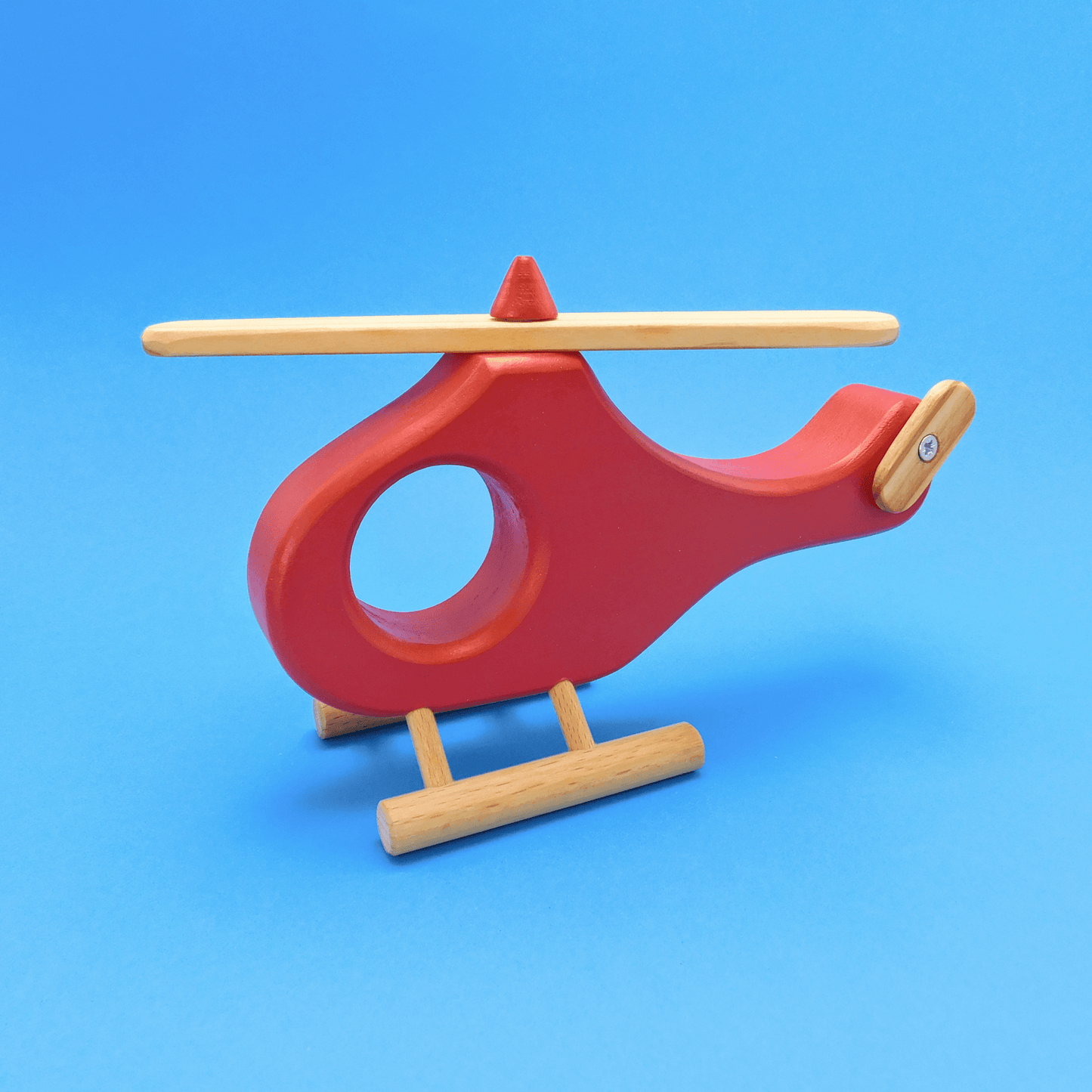 Helicóptero de madera artesanal rojo