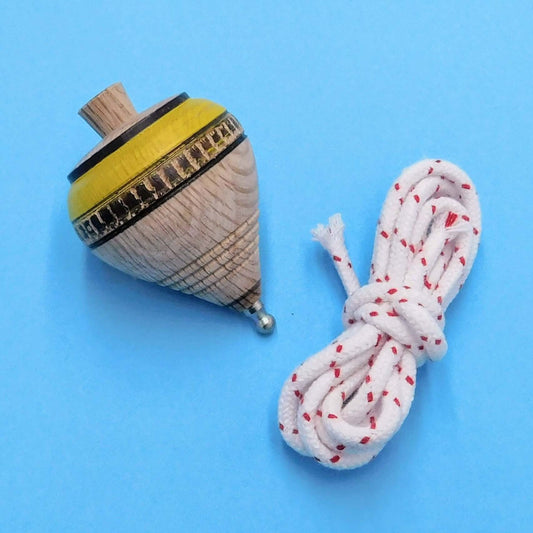 peonza de madera artesanal amarilla